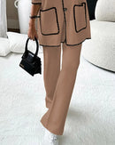 Conjunto de duas peças com top de malha decorado com linha de cor sólida e calças casuais